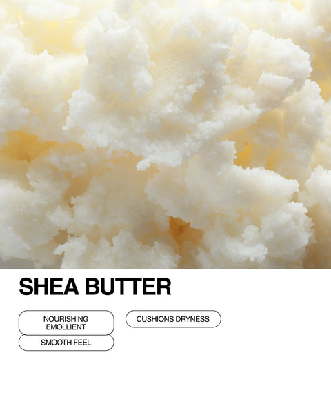 Close-up of creamy, off-white shea butter with a soft, fluffy texture. Text reads: “Shea Butter” and highlights benefits including nourishing emollient, smooth feel, and cushions dryness.
