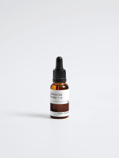 Brown glass dropper bottle with a white label on a light gray background