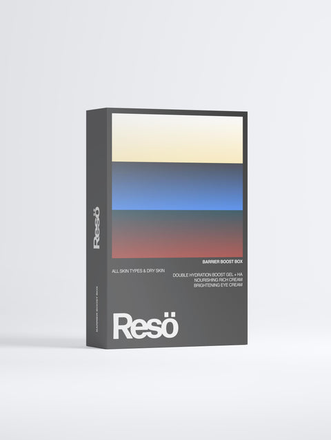The RESÖ Barrier Boost Box showcases a modern gradient design in blue, beige, and red and features a brightening eye cream and hydration gel for radiant, refreshed skin on all skin types, especially dry.
